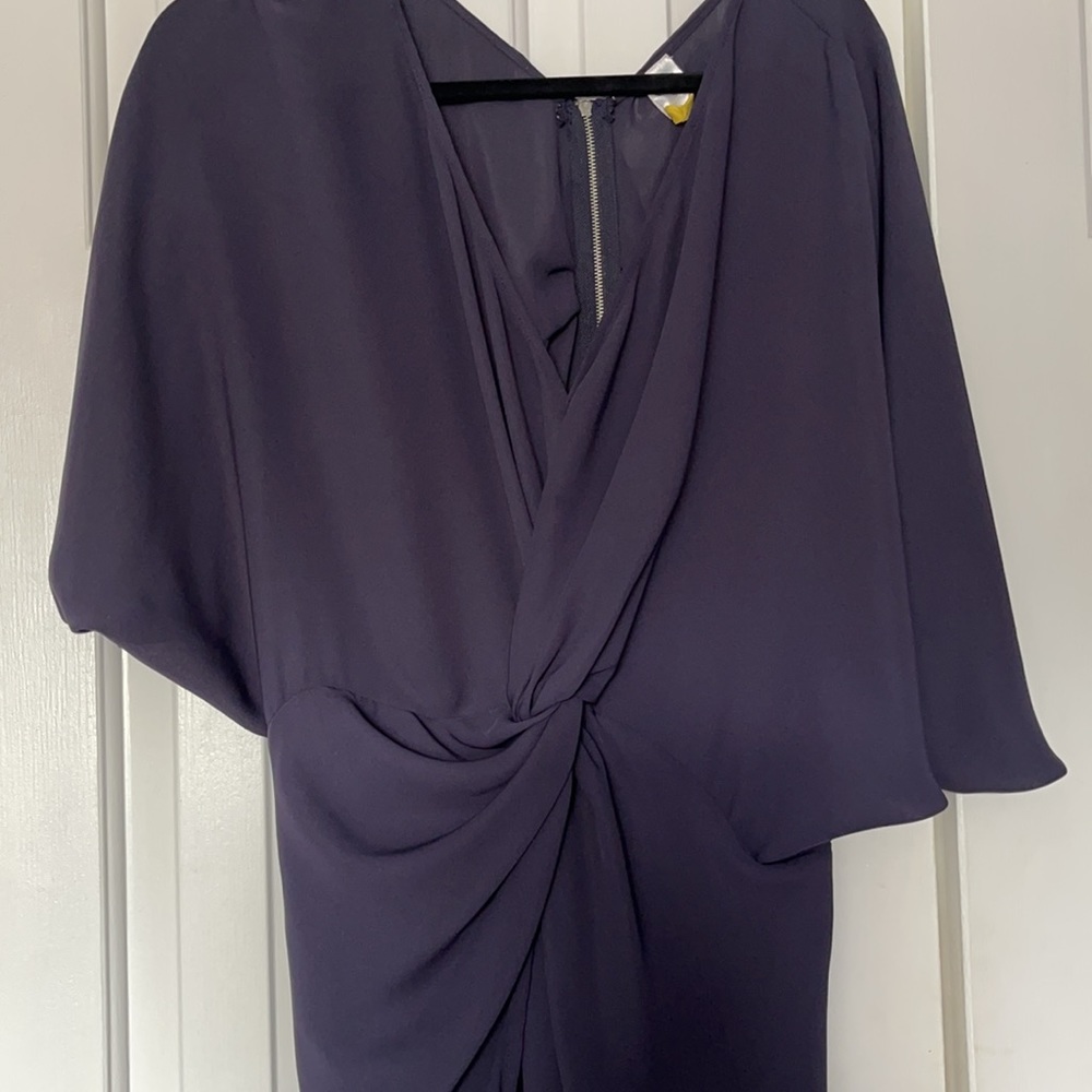 Rare find knot front Belle sleeve ruffle back zip